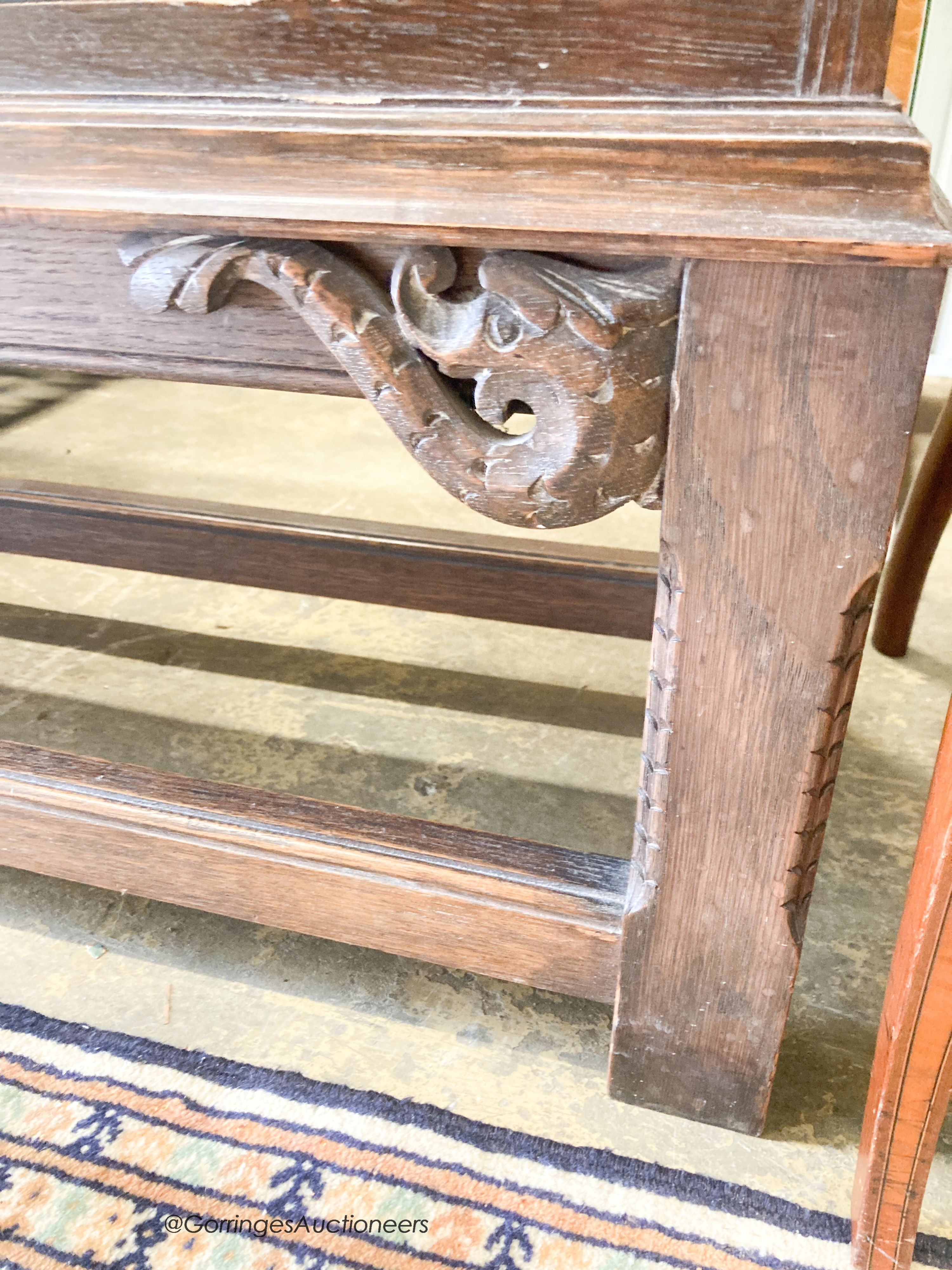 A 1920's oak open bookcase, length 126cm, depth 32cm, height 122cm